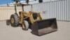 FORD/NEW HOLLAND 545 SKIPLOADER, gp bucket, canopy, rear scraper. s/n:C723261 - 2