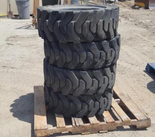 (4) RIMS W/SOLID TIRES, fits Genie GTH5519 Reach Forklift. **(LOCATED IN COLTON, CA)**