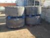 (4) RIMS W/SOLID TIRES, fits Cat 972G loader. **(LOCATED IN COLTON, CA)**