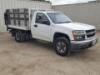 2010 CHEVROLET COLORADO FLATBED TRUCK, 3.7L gasoline, automatic, a/c, pw, pdl, pm, 7' flatbed, stake sides, Tommy Gate lift gate. s/n:1GBHSBDEXA8141454 **(DEALER, DISMANTLER, OUT OF STATE BUYER, OFF-HIGHWAY USE ONLY)** - 2
