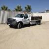 2002 FORD F450 SUPER DUTY FLATBED TRUCK, 7.3L diesel, automatic, a/c, 12' flatbed, stake sides, tool boxes, tow package. s/n:1FDXF46F82EA70881