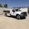 2002 FORD F450 SUPER DUTY FLATBED TRUCK, 7.3L diesel, automatic, a/c, 12' flatbed, stake sides, tool boxes, tow package. s/n:1FDXF46F82EA70881 - 2