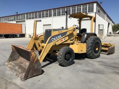 2006 JOHN DEERE 210LE SKIPLOADER, gp bucket, 4x4, aux hydraulics, canopy, rear scraper. s/n:T0210LE884522