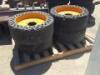 (4) RIMS W/SOLID TIRES, fits skidsteer **(LOCATED IN COLTON, CA)**