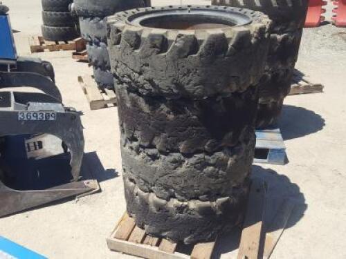 (4) RIMS W/SOLID TIRES, fits Skidsteer. **(LOCATED IN COLTON, CA)**