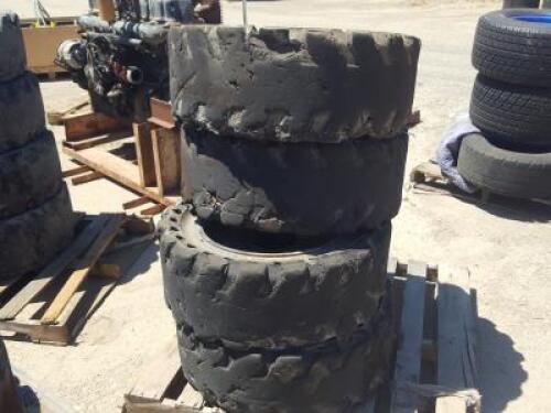 (4) RIMS W/SOLID TIRES, fits Skidsteer. **(LOCATED IN COLTON, CA)**