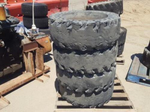 (4) RIMS W/SOLID TIRES, fits Skidsteer. **(LOCATED IN COLTON, CA)**