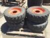 (4) RIMS W/FOAM FILLED TIRES, fits Skidsteer. **(LOCATED IN COLTON, CA)**