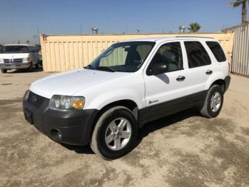 **2006 FORD ESCAPE SUV, 2.3L gasoline hybrid, automatic, a/c, pw, pdl, pm, 55,441 miles indicated. s/n:1FMYU95H46KC95896