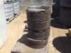 (4) RIMS W/SOLID TIRES, fits Bobcat skidsteer **(LOCATED IN COLTON, CA)**