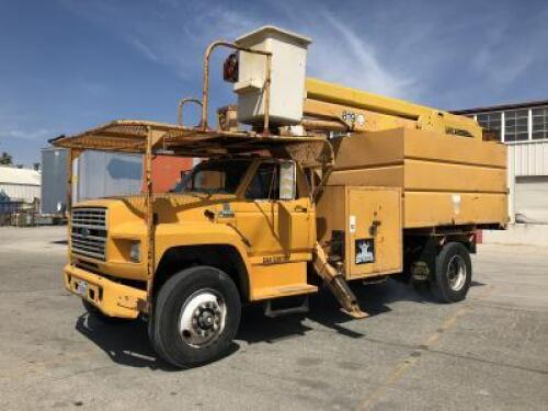 1990 FORD F800 BUCKET TRUCK, Ford 7.8L diesel, automatic, pto, a/c, air brakes, front outriggers, Holan 819 50' boom, 2-stage, s/n:90819019G., 11' chipper body, tool boxes, tow package. s/n:1FDXK84A7LVA35289