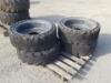 (4) RIMS W/SOLID TIRES, fits skidsteer. **(LOCATED IN COLTON, CA)**