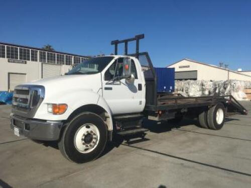 2007 FORD F750 SUPER DUTY EQUIPMENT CARRIER TRUCK, Cummins ISB260 5.9L diesel, 6-speed, a/c, pw, pdl, 12,000# front, 22' deck w/dovetail, 6' ramps, 21,000# rear, 46,089 miles indicated. s/n:3FRXF75HX7V400821