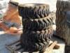 (4) RIMS W/FOAM FILLED TIRES, fits skidsteer. **(LOCATED IN COLTON, CA)**