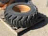 RIM W/TIRE, fits skiploader. **(LOCATED IN COLTON, CA)**