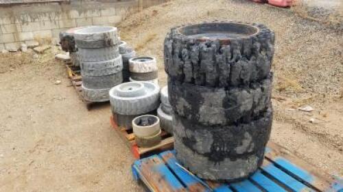 APPROX. (28) RIMS W/SOLID TIRES, fits skidsteer, (4) RIMS W/SOLID TIRES, fits skidsteer, (2) RIMS W/FOAM FILLED TIRES, fits skidsteer **(LOCATED IN COLTON, CA)**