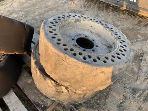 (2) RIMS W/SOLID TIRES, fits Skidsteer. **(LOCATED IN COLTON, CA)**