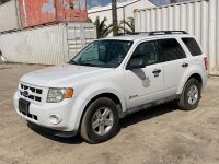 2011 FORD ESCAPE SUV, 2.5L gasoline hybrid, automatic, a/c, pw, pdl, pm, 45,381 miles indicated. s/n:1FMCU5K37BKA99361