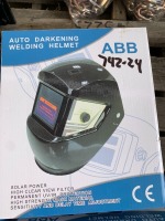 UNUSED AUTO DARKENING WELDING HELMET